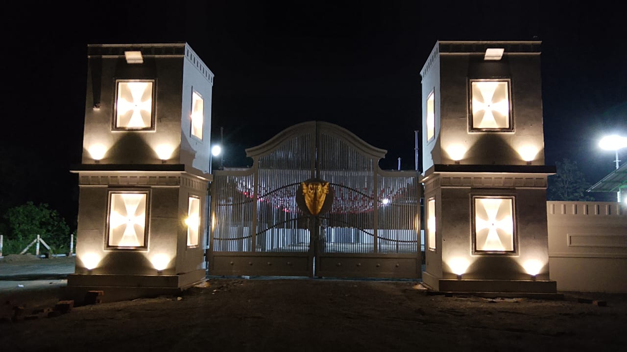 Surabhi SJN entrance gate at night